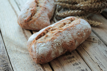 Wholegrain wheat bread rolls with wheta ears.