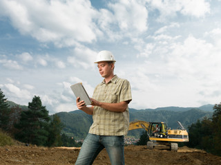 male architect checking construction in progress
