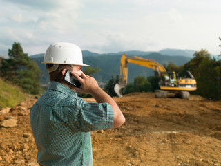 male engineer talking on the phone - 71209882