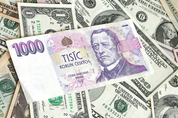 Fototapeta na wymiar heap of dollars with Czech Krone, money background