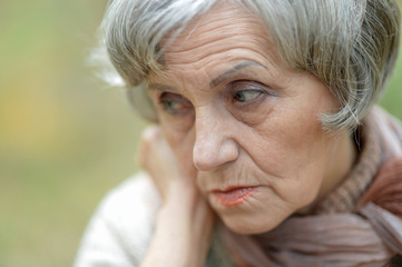 thinking elderly woman