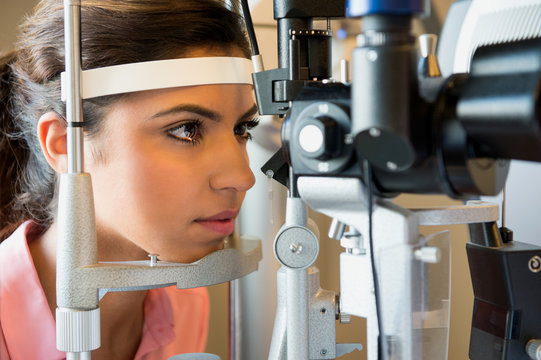 Woman undergoing eye exam