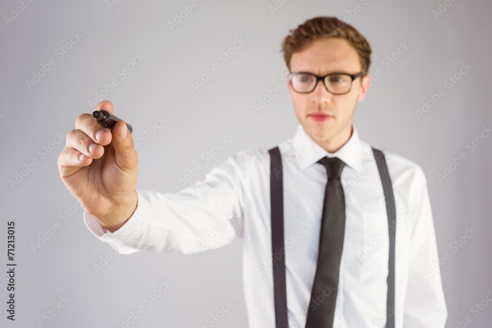 Poster geeky businessman writing with marker