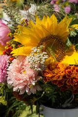 Fototapeta na wymiar beautiful bouquets of flowers and herbs