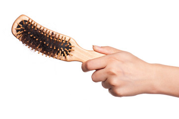 Hairbrush in a hand