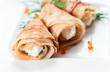 Pancakes with red caviar