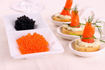 Red caviar and smoked salmon rolls