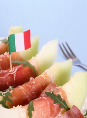 Ripe melon with ham, parmesan with Italy flag