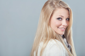 Young beautiful girl in a winter outfit