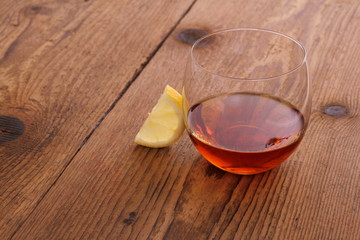 Luxury Cognac in decorative glass with lemon