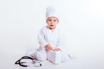 a little boy dressed as doctor