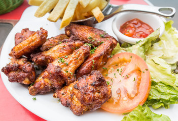 Chicken wings with sauce