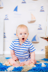 adorable boy with a ship