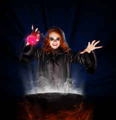 Witch with potion and cauldron on blue rays background