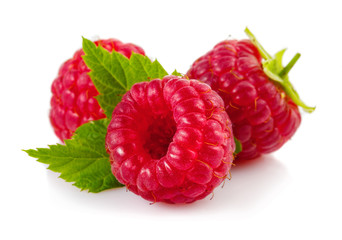 Ripe red raspberries isolated on white