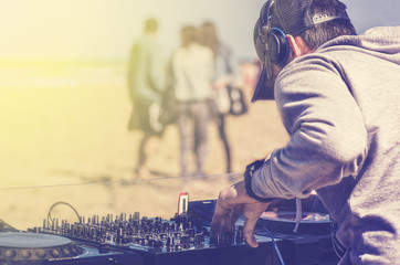 Dee Jay mixing at beach party