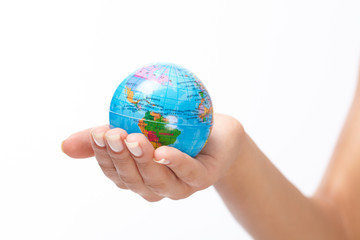 woman's hand with globe