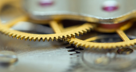 background with metal cogwheels a clockwork. Conceptual photo