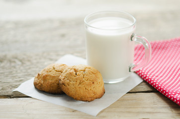 cup of milk with oatmeal cookies