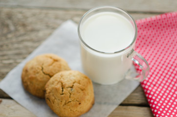 cup of milk with oatmeal cookies