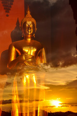 Buddha statue in the glass room with twilight sky reflection