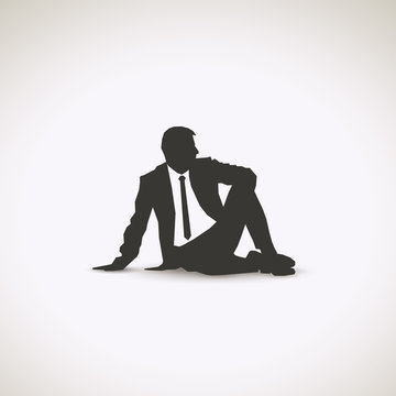 Business Man Sitting Down