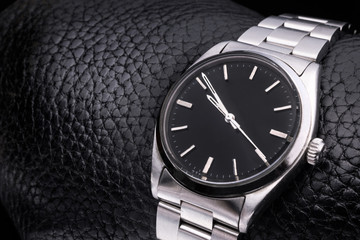 ,  Wrist Watch, Luxury accessory. Leather Background.