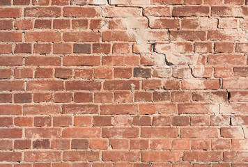 Red brick with a crack background