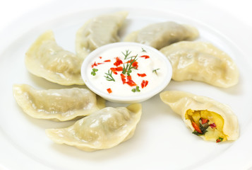 Nepalese food momo on a white background in the restaurant