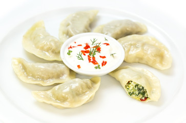 Nepalese food momo on a white background in the restaurant
