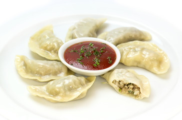 Nepalese food momo on a white background in the restaurant