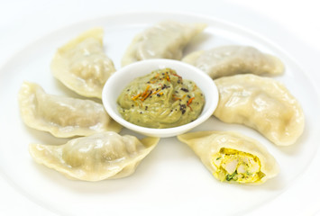 Nepalese food momo on a white background in the restaurant