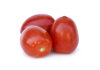 two red tomatoes on white background