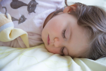 Obraz na płótnie Canvas Closeup portrait of cute sleeping baby.