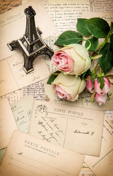roses, antique french postcards and souvenir Eiffel Tower