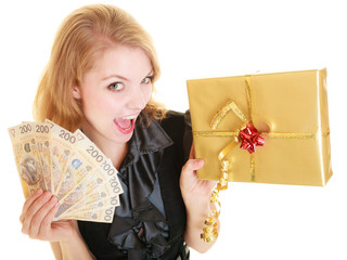 Woman with gift box and polish money banknote.