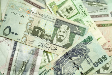 Fototapeta na wymiar Saudi Arabia money, closeup background photo texture