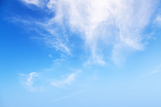 Natural bright blue cloudy sky background texture