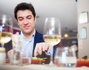 Man having dinner in a restaurant