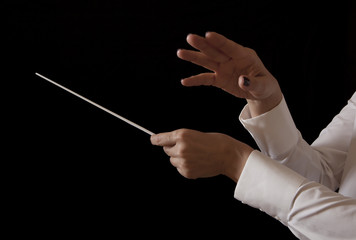 Music female director holding stick