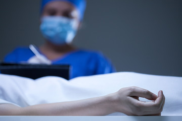 Woman working in mortuary