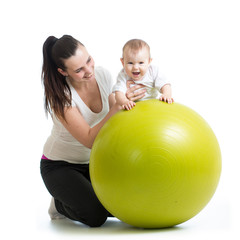 Fototapeta na wymiar gymnastics for baby with fitness ball