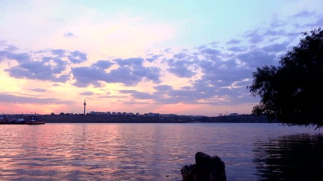 time lapse ferry transportation on the Danube on sunset