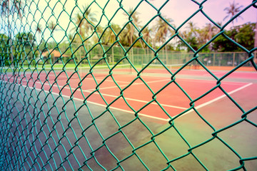 Green Net in front of Tennis Court