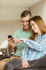 Cute couple relaxing on couch