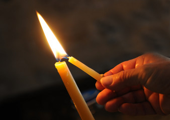 Lighting the candle for pray