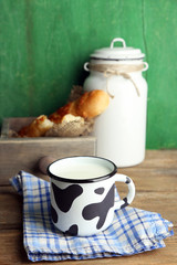 Retro still life with tasty rustic milk, on wooden table