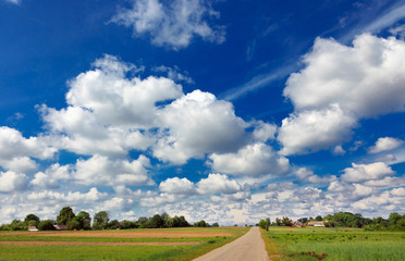 rural landscape with road and clouds