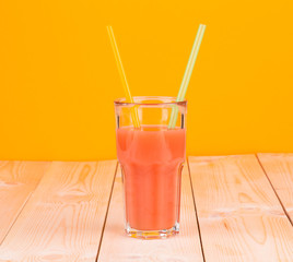 Glass full of tasty fresh grapefruit juice.