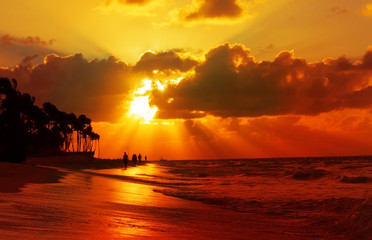 Sunset on the beach of caribbean sea.